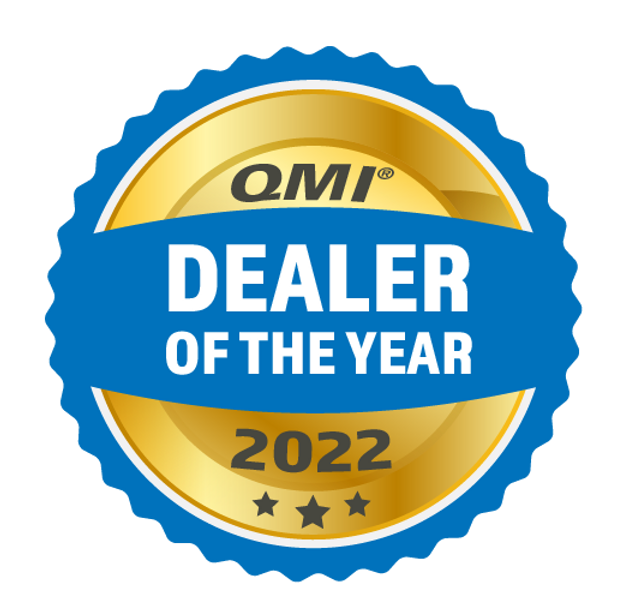 Gold and blue “QMI Dealer of the Year 2022” badge with three stars at the bottom, proudly representing Atlantic Breeze in Morehead City, North Carolina.